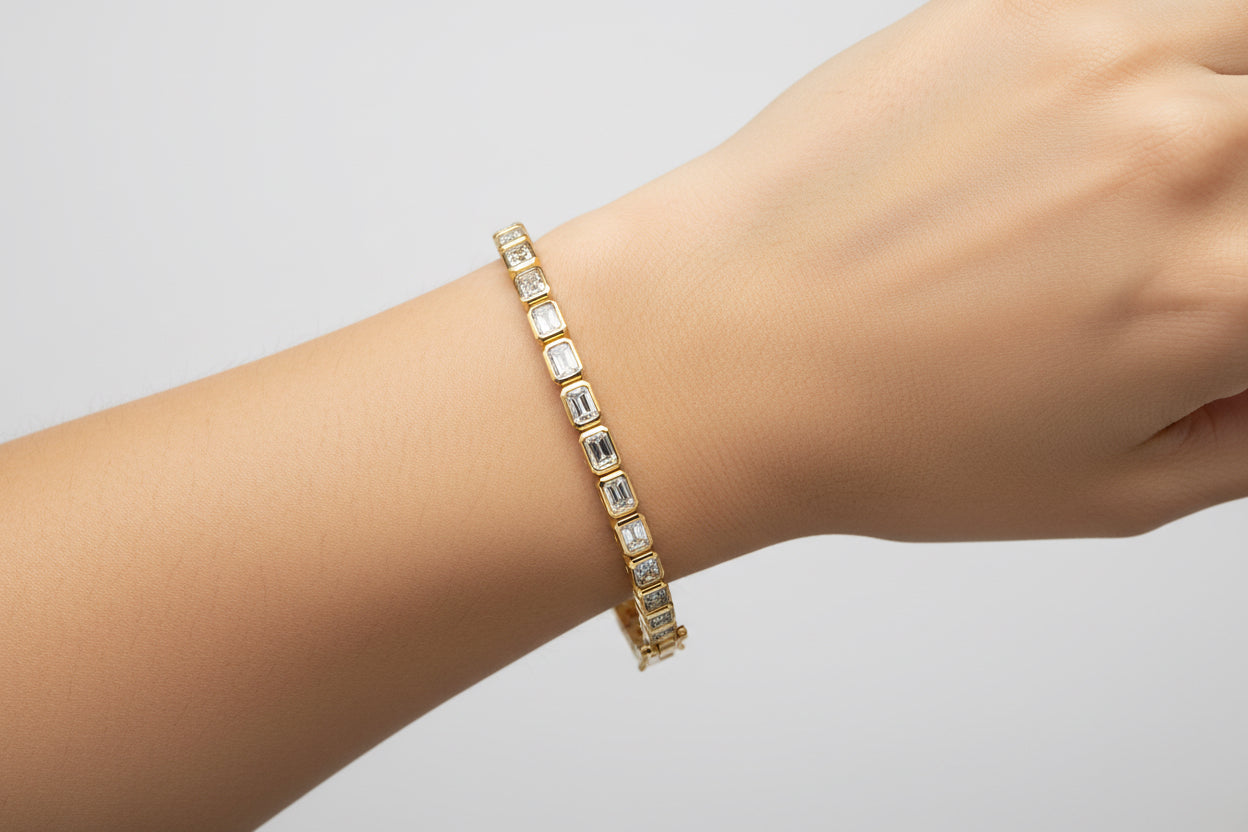 Bezeled Emerald Cut Diamond Tennis Bracelet