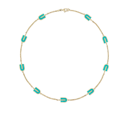 Necklace with gold chain and turquoise U stones